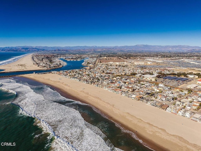 bird's eye view featuring a water and mountain view