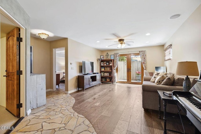 living area with ceiling fan, recessed lighting, baseboards, french doors, and light wood-type flooring