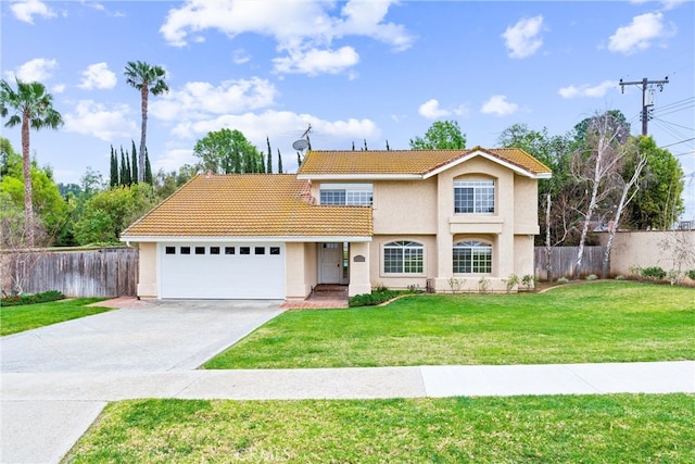 view of front of home featuring concrete driveway, an attached garage, a tile roof, and fence