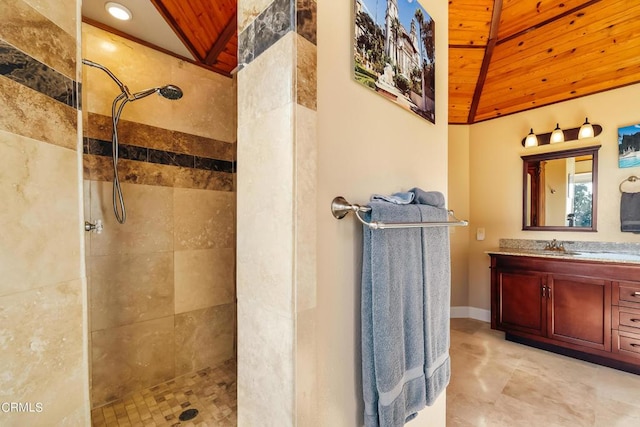 full bathroom with wooden ceiling, tiled shower, and vanity