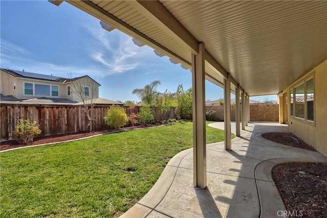 view of yard featuring a fenced backyard and a patio