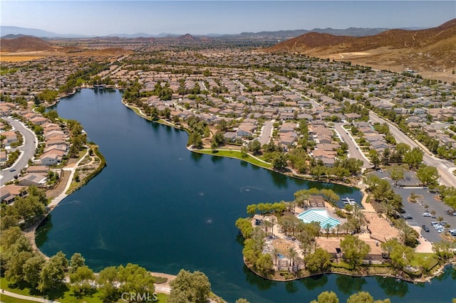 aerial view featuring a residential view and a water and mountain view