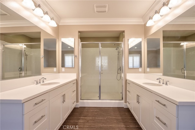 full bath featuring visible vents, a sink, and a stall shower
