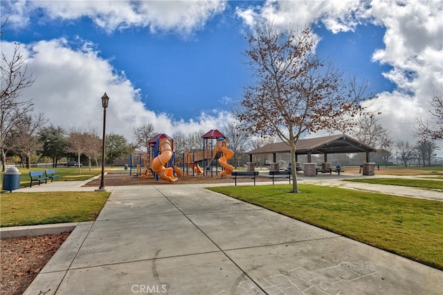 community playground with a yard and a gazebo