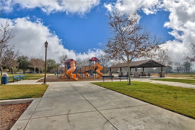 community play area with a gazebo and a yard