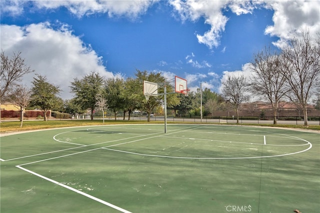 view of sport court with community basketball court and fence