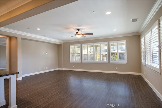 unfurnished living room featuring dark wood-style flooring, visible vents, and crown molding