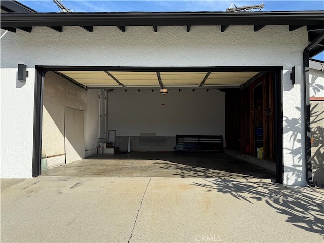 garage with driveway