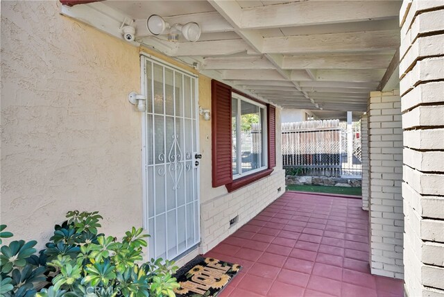 property entrance with fence