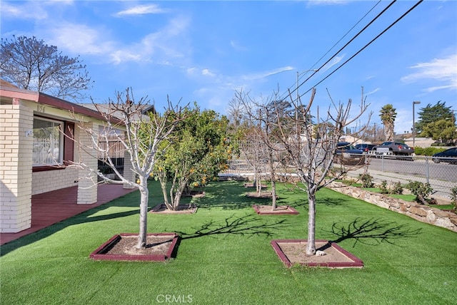 view of yard with fence