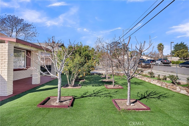 view of yard with fence