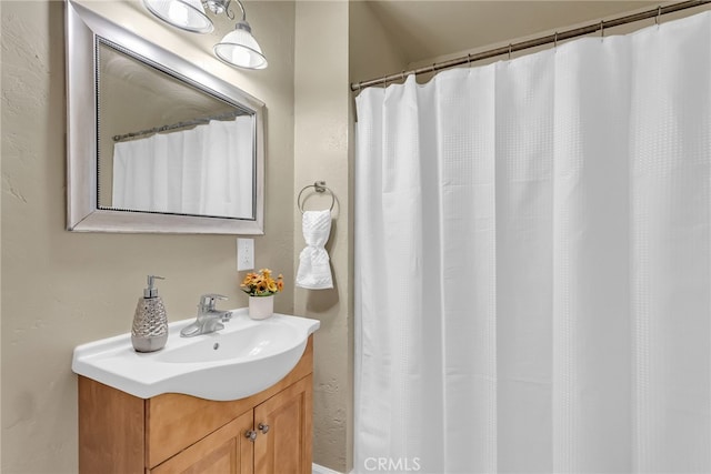 full bathroom with vanity