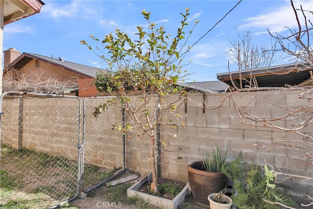 view of yard featuring fence