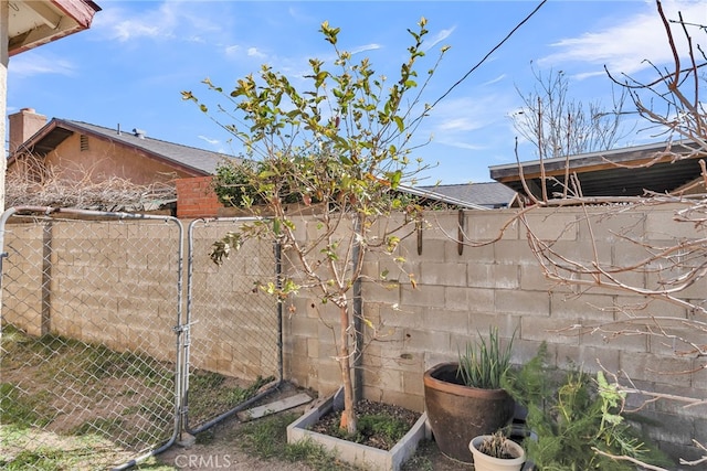 view of yard with fence