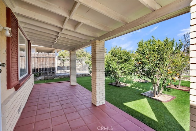 view of patio with fence