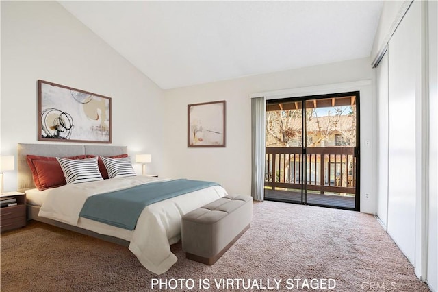 bedroom with lofted ceiling, access to outside, and carpet