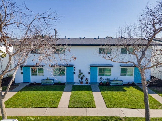 view of property with a front yard