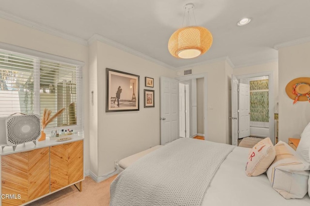 bedroom featuring baseboards, ornamental molding, visible vents, and light colored carpet