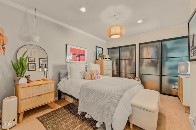 bedroom with recessed lighting, crown molding, and carpet