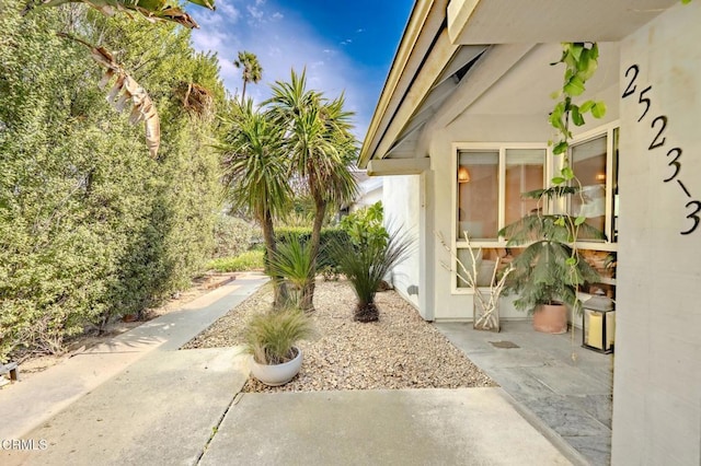 exterior space with stucco siding