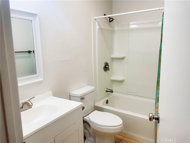 full bath featuring toilet, shower / tub combination, and vanity