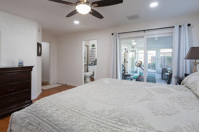 bedroom with access to exterior, dark wood-style floors, recessed lighting, visible vents, and baseboards