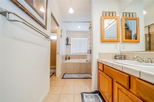 11130 Tenaya Rd, Apple Valley, CA 92308 - full bathroom with vanity, tile patterned floors, and a garden tub