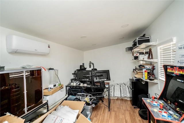 11130 Tenaya Rd, Apple Valley, CA 92308 - office area with a wall mounted air conditioner and wood finished floors
