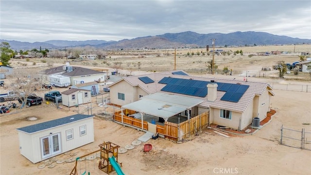 aerial view with a mountain view and a desert view