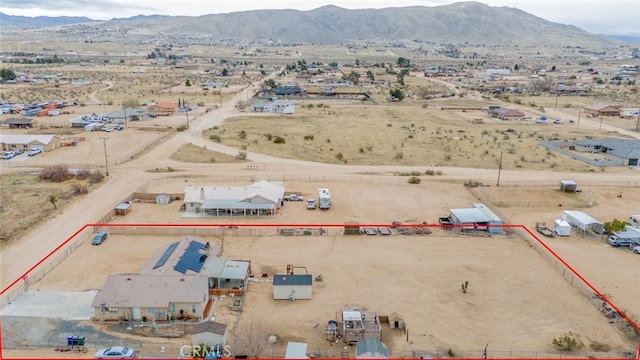 11130 Tenaya Rd, Apple Valley, CA 92308 - aerial overview of property's location featuring property boundaries highlighted, a mountainous background, and a desert landscape