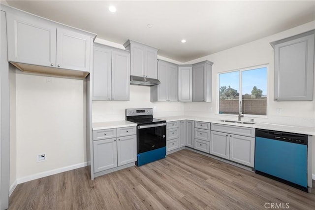 kitchen with dishwasher, under cabinet range hood, gray cabinetry, and stainless steel electric stove