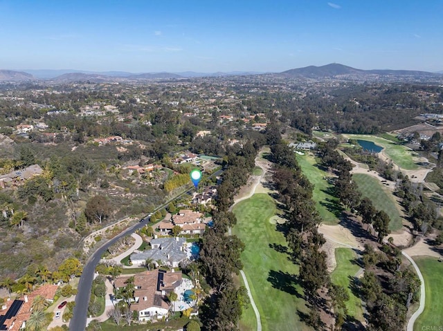 birds eye view of property featuring a residential view, a mountain view, and view of golf course