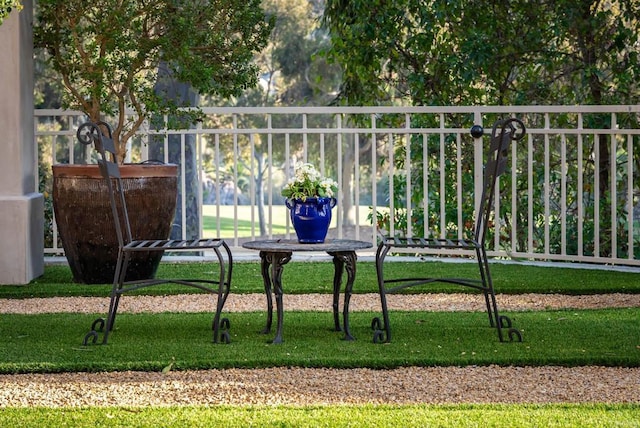 view of community featuring a yard