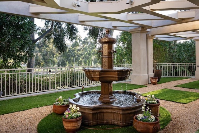 exterior space featuring fence and a pergola