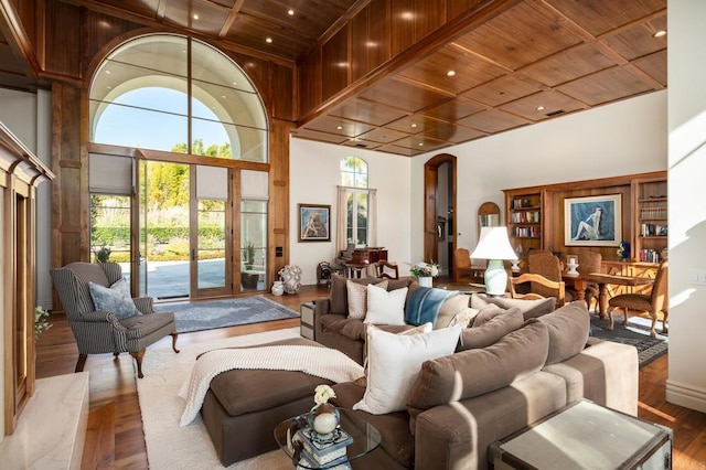 14479 Emerald Ln, Rancho Santa Fe, CA 92067 - living room featuring wood ceiling, wood finished floors, a high ceiling, and arched walkways