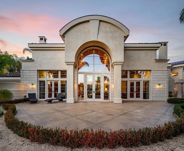 14479 Emerald Ln, Rancho Santa Fe, CA 92067 - back of house with french doors, a patio area, and stucco siding