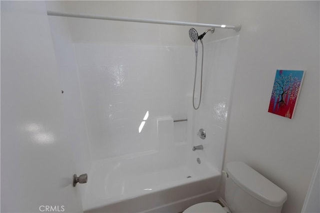 full bathroom with toilet and tub / shower combination