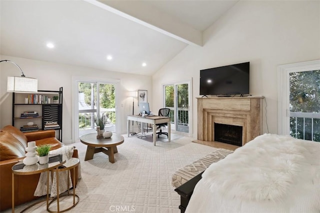 living area with beam ceiling, high vaulted ceiling, a fireplace, and recessed lighting
