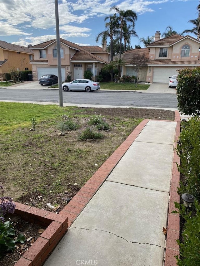 view of yard featuring a residential view