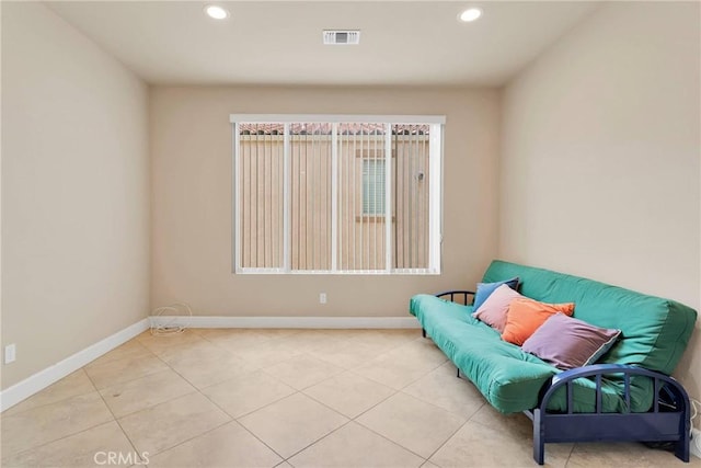 sitting room featuring recessed lighting, tile patterned floors, and baseboards