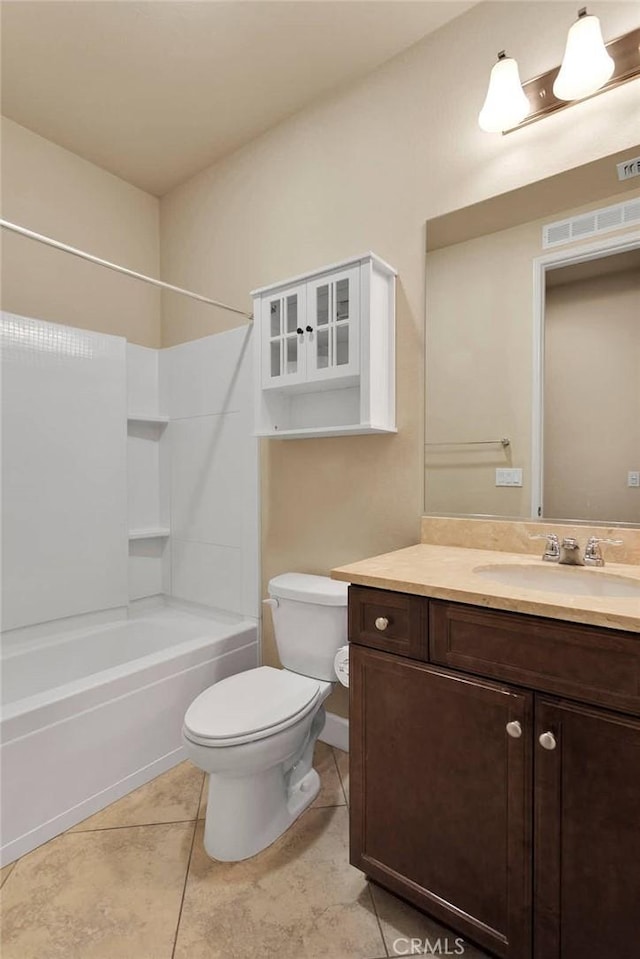 full bathroom featuring visible vents, shower / bathing tub combination, toilet, vanity, and tile patterned floors