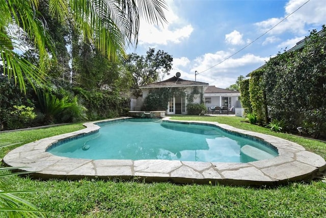 outdoor pool with a patio