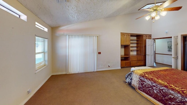 bedroom featuring a textured ceiling, high vaulted ceiling, ceiling fan, carpet flooring, and baseboards