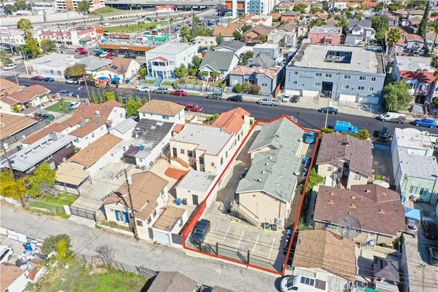 birds eye view of property with a residential view