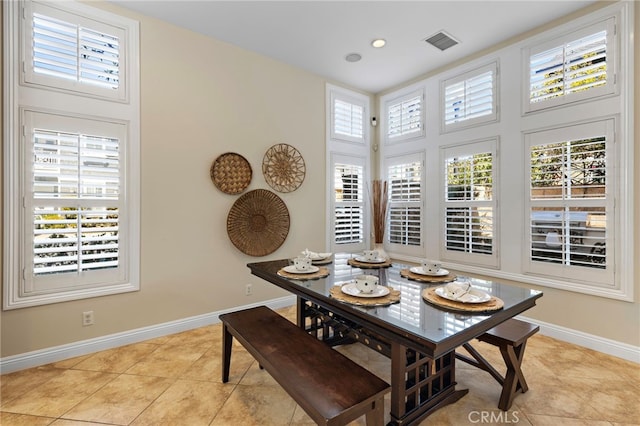 dining area with recessed lighting, light tile patterned floors, baseboards, and visible vents