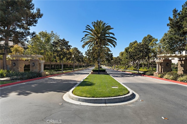 view of road featuring curbs and sidewalks