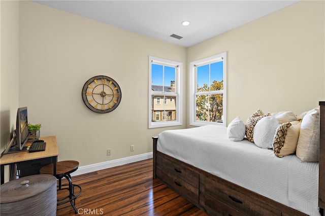 bedroom featuring recessed lighting, visible vents, baseboards, and dark wood-style floors