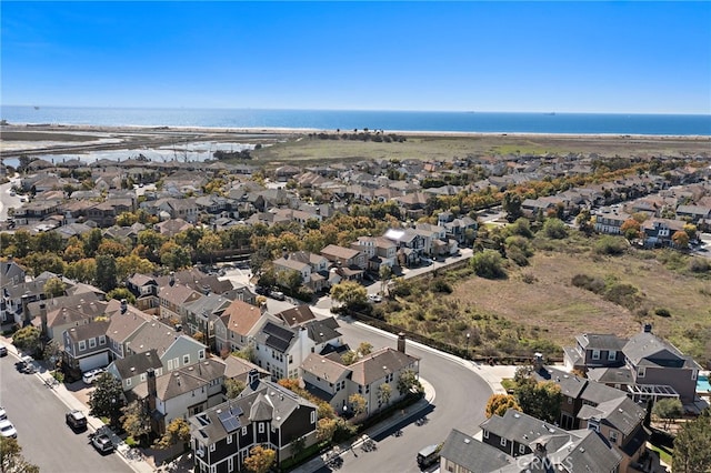 aerial view with a residential view and a water view