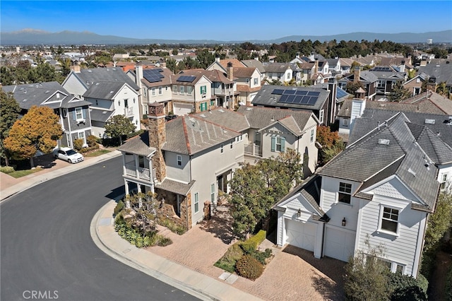 birds eye view of property with a residential view