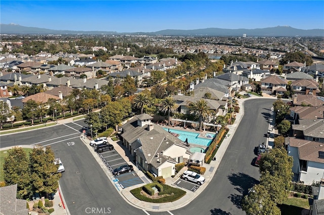 drone / aerial view featuring a mountain view and a residential view